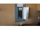 View of the home's electrical panel with labels and contact information for appliance service and landscaping companies at 156 Grand Canal Dr, Poinciana, FL 34759