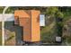 An aerial view of a charming single-Gathering home featuring a well-maintained roof and a private backyard at 206 Memphis Pl, St Cloud, FL 34769