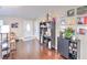 Well-decorated living room featuring hardwood floors, stylish furniture, and a welcoming ambiance at 206 Memphis Pl, St Cloud, FL 34769
