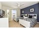 Bedroom with two twin beds, nightstands, and a TV at 2112 Morocco Way, Kissimmee, FL 34747