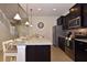 Eat-in kitchen with large island and stainless steel appliances at 2112 Morocco Way, Kissimmee, FL 34747