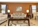 Living room with contemporary couch and coffee table at 2112 Morocco Way, Kissimmee, FL 34747