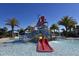 Community waterpark with slides and splash pad at 2112 Morocco Way, Kissimmee, FL 34747