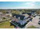 Aerial view of colorful townhomes amidst lush landscaping at 2203 San Vittorino Cir # 107, Kissimmee, FL 34741