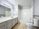 Bathroom features shower/tub combo and neutral vanity at 2203 San Vittorino Cir # 107, Kissimmee, FL 34741
