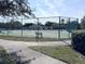 Community tennis court is ready for a relaxing game of tennis at 2203 San Vittorino Cir # 107, Kissimmee, FL 34741