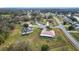 Aerial view of the property showcasing its expansive lot and charming neighborhood setting at 3039 China Berry Ct, Kissimmee, FL 34746