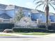 Elegant stone entrance sign for William's Preserve, surrounded by manicured hedges and a palm tree at 361 Annabelle Way, Davenport, FL 33837