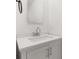 Bathroom vanity features white countertop, chrome faucet, and modern hardware at 3827 Anna Dr, Apopka, FL 32703