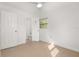 Neutral bedroom with ceiling fan features connecting bathroom with toilet and tile flooring at 3827 Anna Dr, Apopka, FL 32703