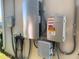 Image of the electrical system and the power inverters for the solar panel system at 3857 San Isidro Cir, St Cloud, FL 34772