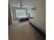 Bedroom with carpet, a ceiling fan, and two twin beds, perfect for guests or children at 4010 San Gallo Dr # 105, Kissimmee, FL 34741