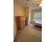 Bedroom with dresser and window at 4010 San Gallo Dr # 105, Kissimmee, FL 34741