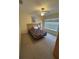Bedroom features a neutral color scheme and ceiling fan at 4010 San Gallo Dr # 105, Kissimmee, FL 34741