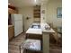 Well-lit kitchen with modern appliances and a breakfast bar at 4010 San Gallo Dr # 105, Kissimmee, FL 34741