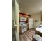 Bright kitchen with wooden cabinets and modern appliances at 4010 San Gallo Dr # 105, Kissimmee, FL 34741