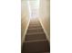 Carpeted staircase leads to the upper level of the house at 4010 San Gallo Dr # 105, Kissimmee, FL 34741