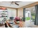 Bright dining area with slider door access to the backyard and a view of a shed at 4126 Montrose Ct, Orlando, FL 32812