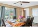 Dining room with a table set for six and sliding glass doors at 4126 Montrose Ct, Orlando, FL 32812