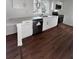 White kitchen featuring stainless steel appliances, shaker cabinets and quarts countertops at 451 Sw 2Nd St, Ocala, FL 34471