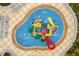 Aerial image of the resort waterpark splashpad with slides, lounge chairs, and splash zones at 561 Lasso Dr, Kissimmee, FL 34747