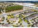 Aerial view of neighborhood with neatly landscaped front yards at 561 Lasso Dr, Kissimmee, FL 34747