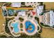 Aerial shot of resort waterpark showcasing vibrant slides, pools, and landscaping at 561 Lasso Dr, Kissimmee, FL 34747