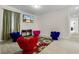 Fun bonus room with unique chairs and a large TV for entertainment at 561 Lasso Dr, Kissimmee, FL 34747