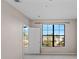 Bedroom window with blind; trees visible in the background at 6109 Metrowest Blvd # 105, Orlando, FL 32835