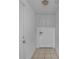 Neutral-toned entryway with two doors and tiled flooring at 6109 Metrowest Blvd # 105, Orlando, FL 32835
