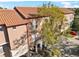 A Mediterranean style condo, featuring a beautiful tile roof and a stucco exterior at 6109 Metrowest Blvd # 105, Orlando, FL 32835
