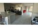 Spacious kitchen featuring an island, stainless steel appliances, and tile floors at 735 Chinoy Rd, Davenport, FL 33837