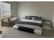 Inviting main bedroom with a queen-sized bed, a modern bed frame, and neutral decor at 735 Chinoy Rd, Davenport, FL 33837