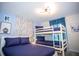 Charming bedroom featuring bunk beds and tasteful decorations at 750 Pebble Beach Dr, Davenport, FL 33896