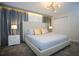Serene bedroom with plush bedding, ambient lighting, and soft color palette at 750 Pebble Beach Dr, Davenport, FL 33896