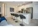Eat-in kitchen offering seating and modern stainless steel appliances at 750 Pebble Beach Dr, Davenport, FL 33896