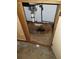 Image shows under the sink with extensive water damage at 800 Nicole Blvd, Ocoee, FL 34761