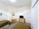 Cozy bedroom featuring two twin beds, offering a comfortable and inviting space at 802 Brunello Dr, Davenport, FL 33897