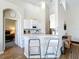 Compact kitchen area with ample counter space and a pass-through to the dining area at 802 Brunello Dr, Davenport, FL 33897