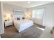 Bright bedroom with neutral colors, a large window, and plush carpeting at 8885 Cabot Cliffs Dr # 103, Davenport, FL 33896