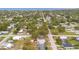 Real estate aerial view of a residential neighborhood with waterfront access at 900 Delaware Ave, St Cloud, FL 34769