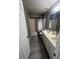 Bathroom with a double vanity, tub, and shower at 920 Gillingham Ct, Kissimmee, FL 34758