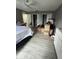 Bedroom featuring gray walls, ceiling fan, two closets, and dresser at 920 Gillingham Ct, Kissimmee, FL 34758