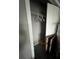Small closet featuring neutral walls and shelf with hanging rod and boxes at 920 Gillingham Ct, Kissimmee, FL 34758