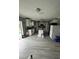 Open kitchen featuring an island and stainless steel appliances at 920 Gillingham Ct, Kissimmee, FL 34758