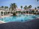 A luxurious community pool featuring crystal clear water and a resort-style setting at 11446 Jasper Kay Ter # 106, Windermere, FL 34786