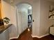 Hallway view towards the bedroom showing access to laundry space at 11446 Jasper Kay Ter # 106, Windermere, FL 34786