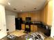 Bright kitchen with light cabinets and essential appliances, well-lit with natural light at 11446 Jasper Kay Ter # 106, Windermere, FL 34786