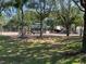 A well-maintained playground featuring swings, slides, and climbing structures at 11446 Jasper Kay Ter # 106, Windermere, FL 34786