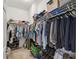 Organized walk-in closet with ample shelving and hanging space at 1398 Del Mar Dr, Kissimmee, FL 34759